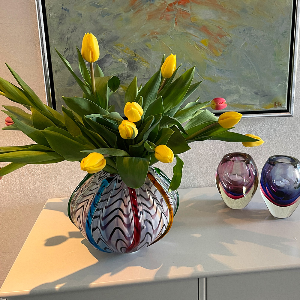 Add colors to your home with a mouth-blown glass vase
