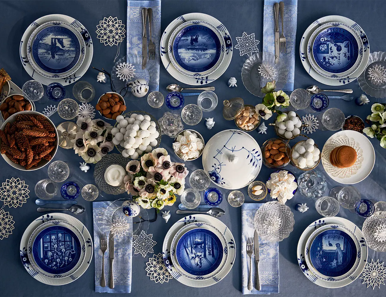 Royal Copenhagen Christmas plates on the table. - Find them all here